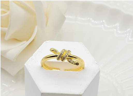 Gold-Plated Crystal Knot Ring – Adjustable Love Knot Statement Band