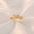 Gold-Plated Crystal Knot Ring – Adjustable Love Knot Statement Band