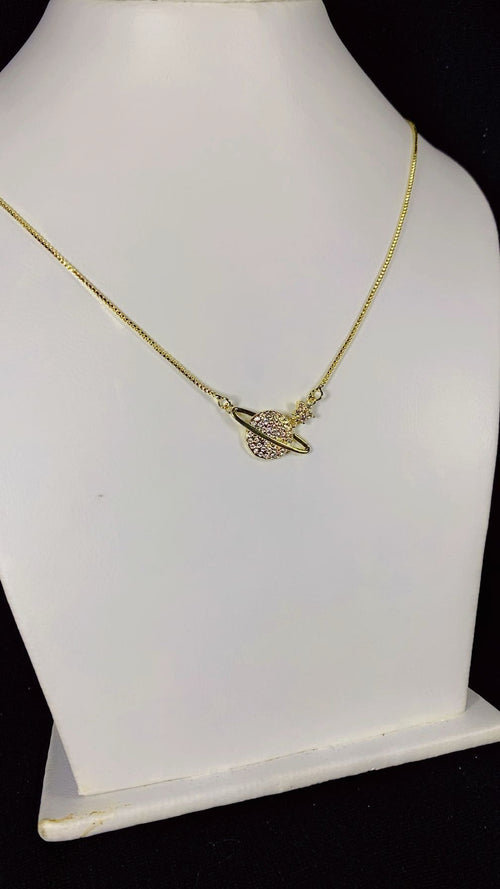 Celestial Saturn Planet & Star Zircon Necklace – 18K Gold Plated