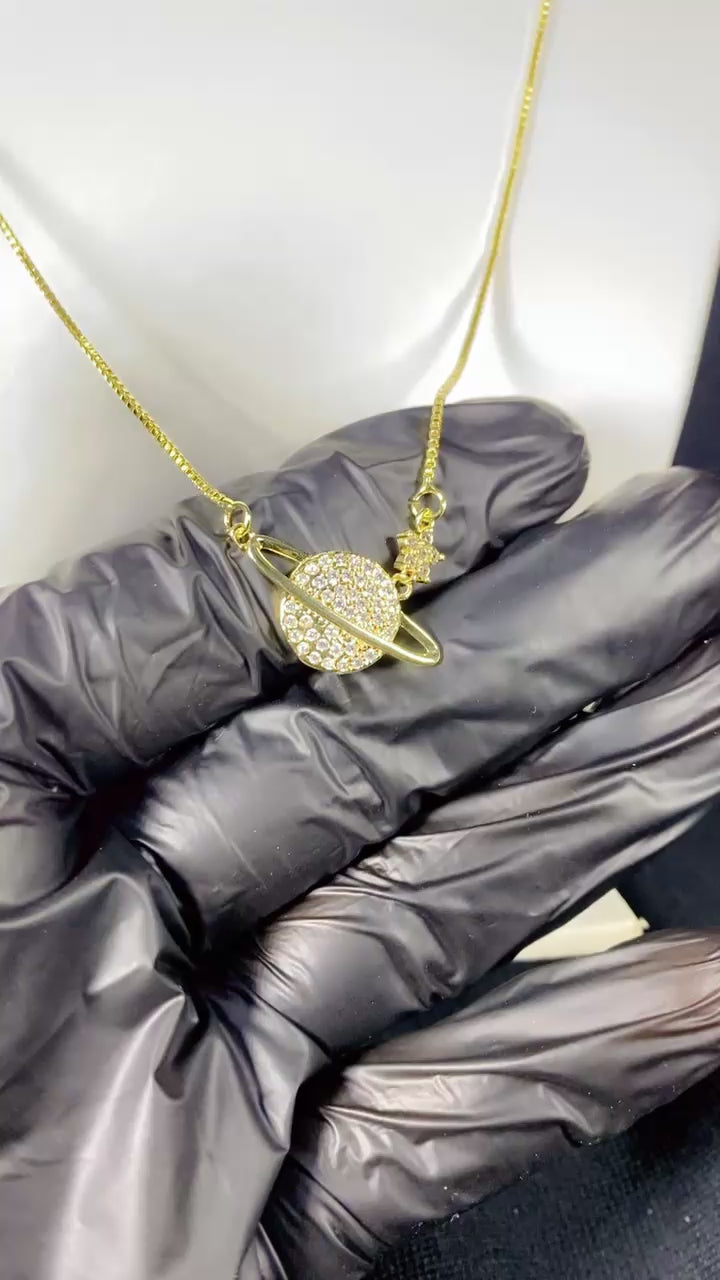 Celestial Saturn Planet & Star Zircon Necklace – 18K Gold Plated